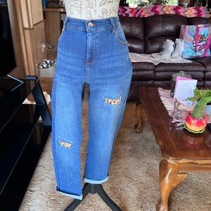 Chico’s Perfect Stretch Girlfriend Slim Leg Ankle 2 ripped cheetah jeans.